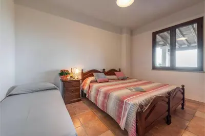 Letto o letti in una camera di Casa Pompia 6