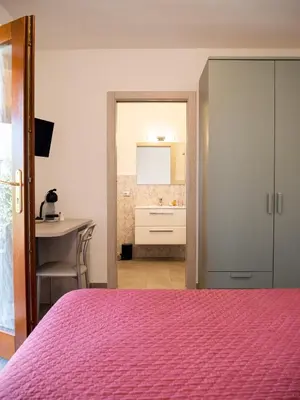 Letto o letti in una camera di Samar