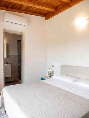 Letto o letti in una camera di Samar