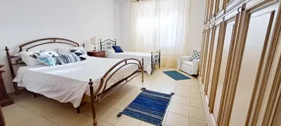 Letto o letti in una camera di Casa Verdi Telti
