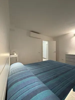 Letto o letti in una camera di Porto San Paolo Nature Apartment