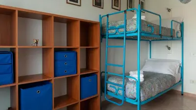 Letto o letti a castello in una camera di Gabbiani - Cala Gonone