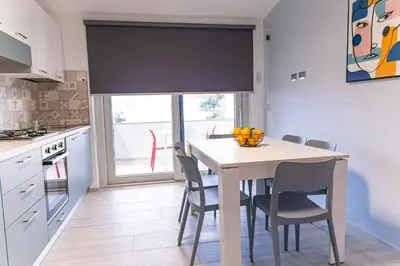Cucina o angolo cottura di Casa Jo del Mare, a pochi passi dalla spiaggia