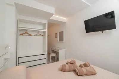 Letto o letti in una camera di Domo de Centro, centro di Olbia