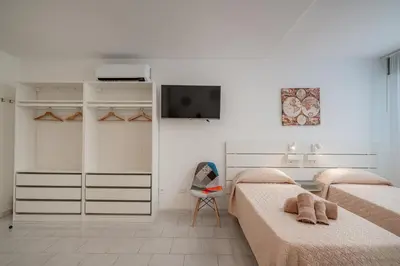Letto o letti in una camera di Domo de Centro, centro di Olbia