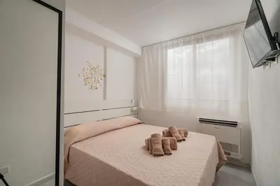 Letto o letti in una camera di Domo de Centro, centro di Olbia