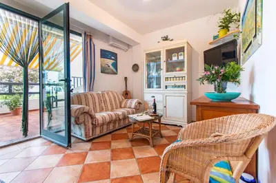 Area soggiorno di Fòlia Apartment