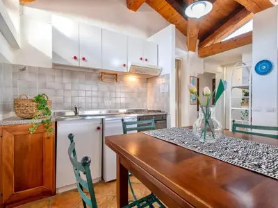 Cucina o angolo cottura di Apartment 4 beds in Residence in Golfo Aranci just 150 mt from the sea