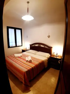 Letto o letti in una camera di La casa nel borgo, in a cozy charming village, 15 min to Beach, Small pets welcome