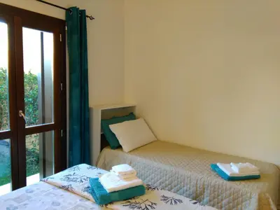 Letto o letti in una camera di Casa Marina Maria