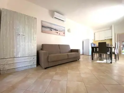 Area soggiorno di Conchiglia Family Garden Retreat - 2BR - Near the Sea - Wi-Fi - AC - BBQ - Pet Friendly