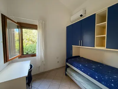 Letto o letti in una camera di Villa Maria