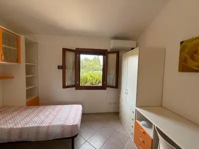 Letto o letti in una camera di Villa Maria
