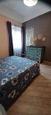 Letto o letti in una camera di Rosa's Flat
