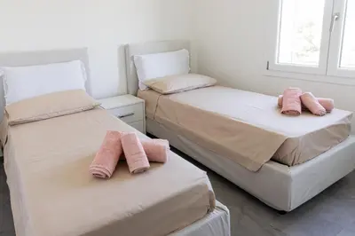 Letto o letti in una camera di VivimiHome - Monti House