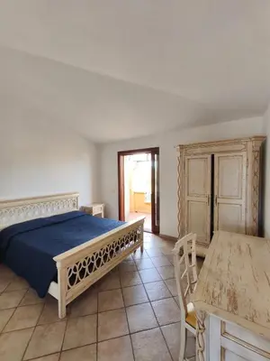 Letto o letti in una camera di Residenza Le Lantane