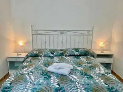Letto o letti in una camera di Mirto Beachside Apartment - 2BR - Wi-Fi - AC - 100m from the Beach - BBQ - Parking
