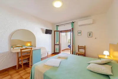 Letto o letti in una camera di Hotel Mare Blue