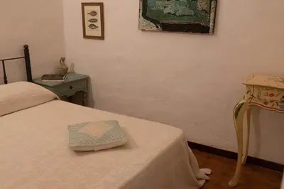 Letto o letti in una camera di Domo Ilde e Mare