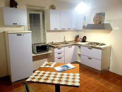Cucina o angolo cottura di CASA VACANZE SARDEGNA in Gallura 1KM dal mare