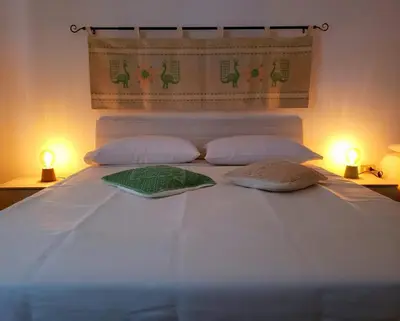 Letto o letti in una camera di CASA VACANZE SARDEGNA in Gallura 1KM dal mare