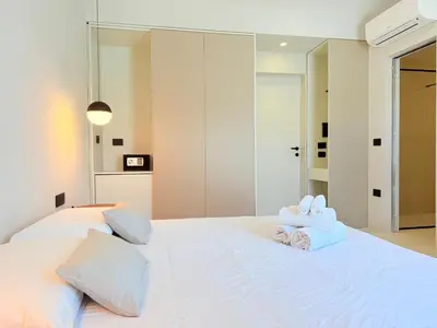 Letto o letti in una camera di I Nidi di Dommos - Camere nel centro storico di Orosei