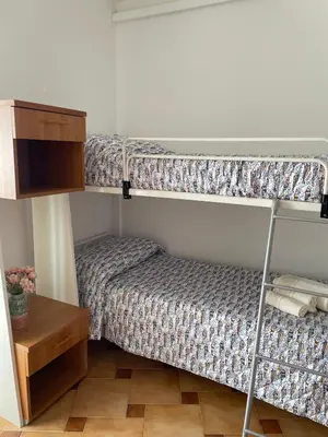 Letto o letti in una camera di Luna di mare Porto Ottiolu