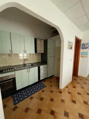 Cucina o angolo cottura di Luna di mare Porto Ottiolu