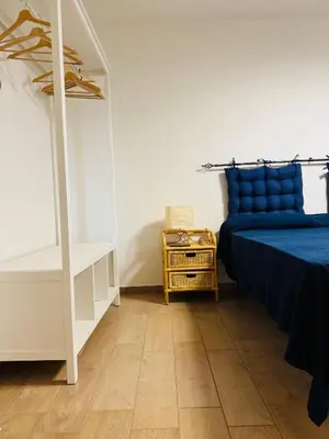 Letto o letti in una camera di Casa Lulù