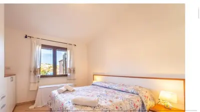 Letto o letti in una camera di Casa Da Vinci