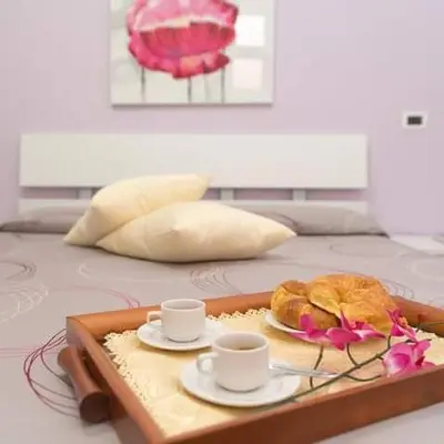 Letto o letti in una camera di Affittacamere Meta Mito