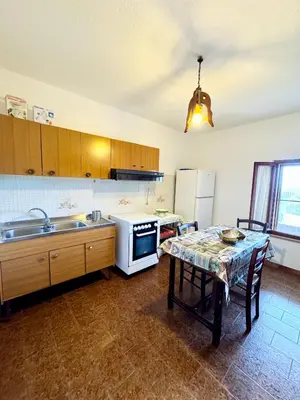 Cucina o angolo cottura di Trilocale L&L San Teodoro