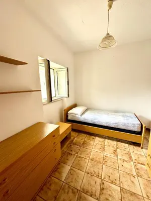 Letto o letti in una camera di Trilocale L&L San Teodoro