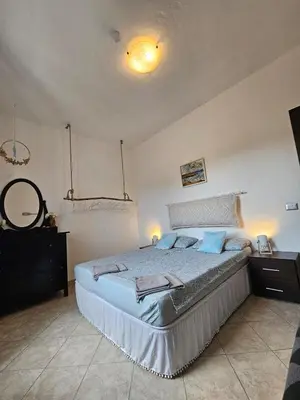 Letto o letti in una camera di Casa Pellegrino