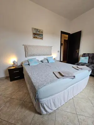 Letto o letti in una camera di Casa Pellegrino