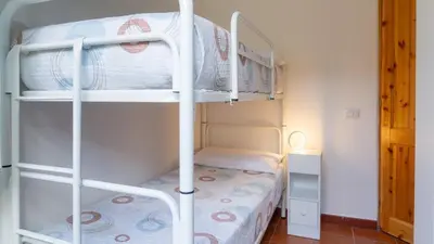 Letto o letti in una camera di Fuili Sunrise - Cala Gonone