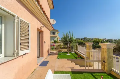 Giardino di Apartment with garden