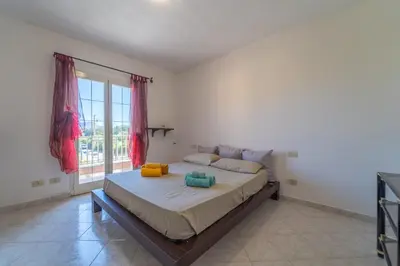 Letto o letti in una camera di Apartment with garden