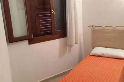 Letto o letti in una camera di Apartments in Tanaunella 53782