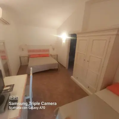 Letto o letti in una camera di Fratelli muzzu