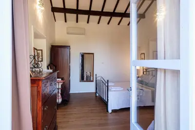 Letto o letti in una camera di Stazzu Straetu antico stazzo Gallurese con vista sul Golfo di Olbia