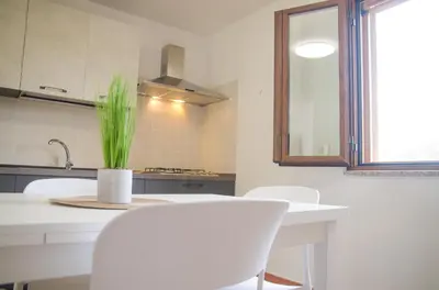 Cucina o angolo cottura di EVH Residence San Giovanni