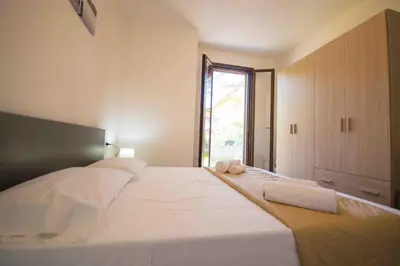 Letto o letti in una camera di EVH Residence San Giovanni
