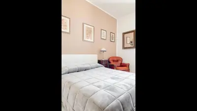 Letto o letti in una camera di B&B Maison Rosetta IUN-E4948