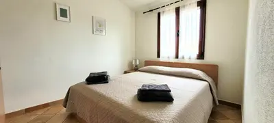Letto o letti in una camera di Casa Nala - Villa con giardino
