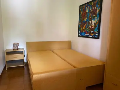 Letto o letti in una camera di casa spiaggia San Teodoro