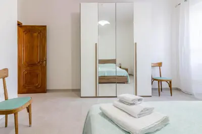 Letto o letti in una camera di GuestHost Peaceful stay in Berchiddeddu with garden
