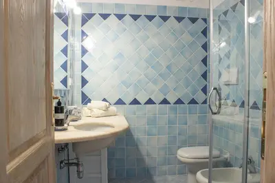 Bagno di Bilocale tra terra e mare