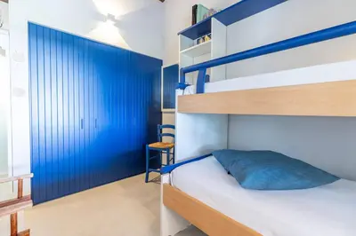 Letto o letti in una camera di Casa Luce