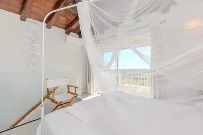Letto o letti in una camera di Casa Luce